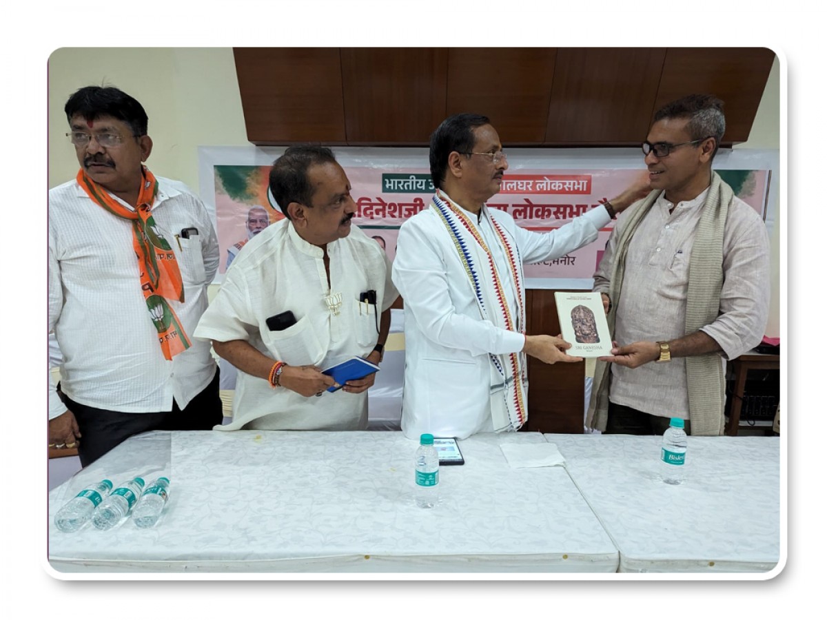 Presenting Integral books to Dinesh Sharma (Member of Rajya Sabha)