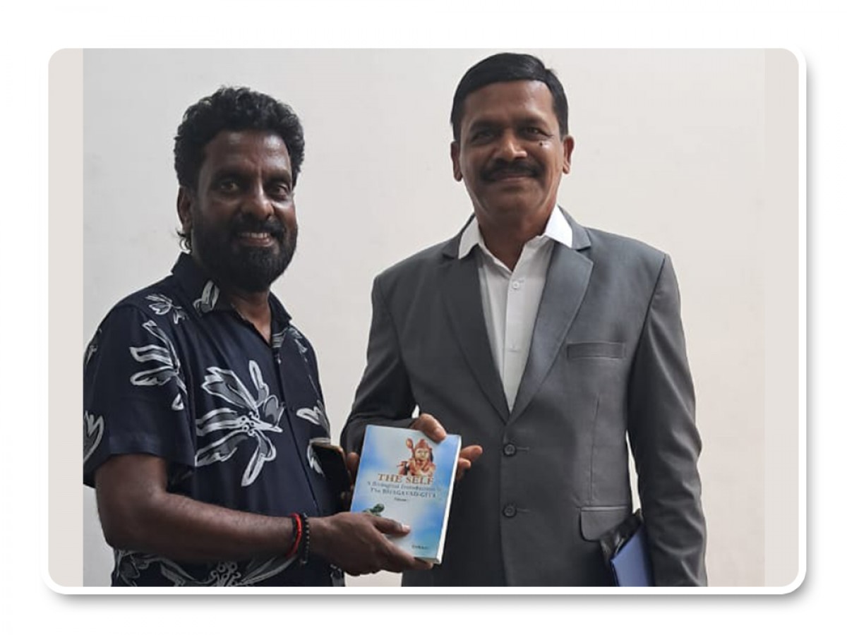 Presenting Integral books to Dr. Thangvelu Add.superintendent of police(cyber crime Chennai)